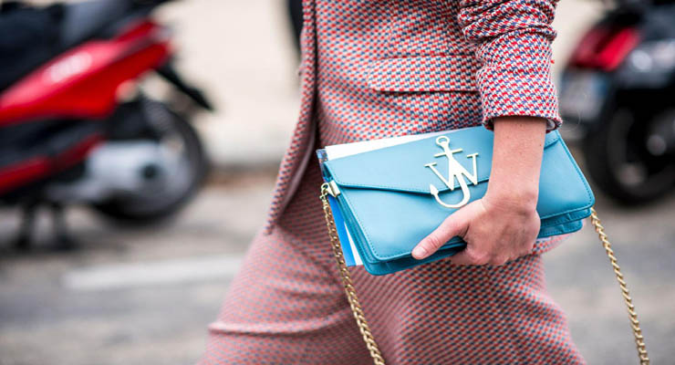 a turquoise clutch purse bag
